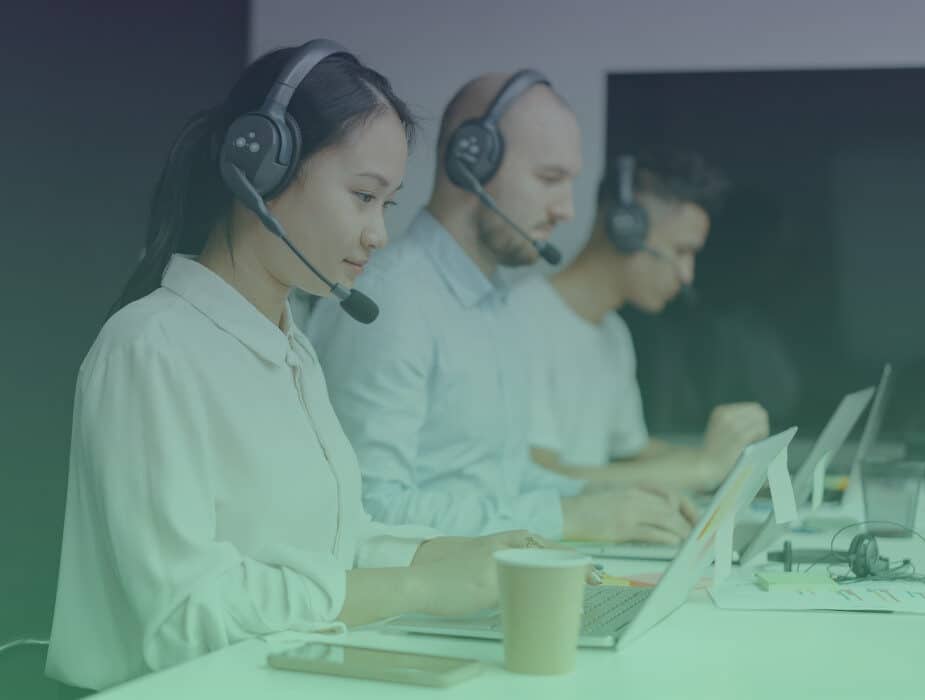 Image of a team of three contact centre agents using headsets.